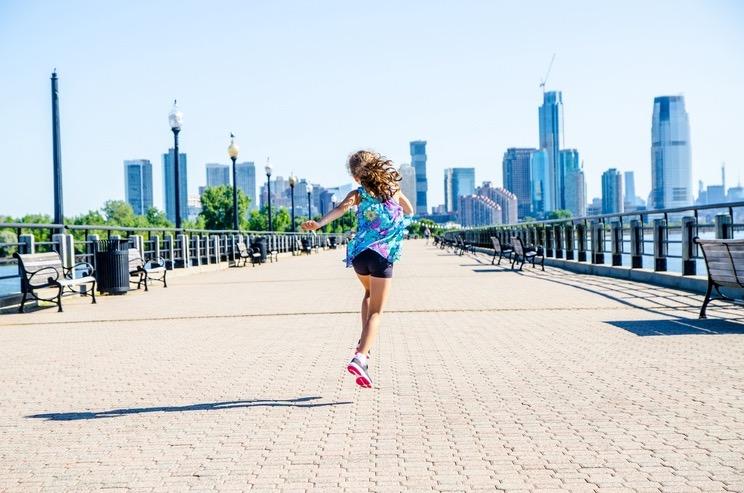 girl jumping in the park